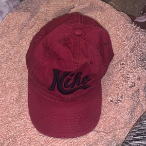 This is a vintage bubble letter maroon Nike. Hopefully it will fit one of you!